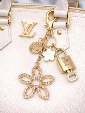 Authentic Louis Vuitton Gold Lock & Key 🔑 Bag Charm w/ Unbranded Clover Charm